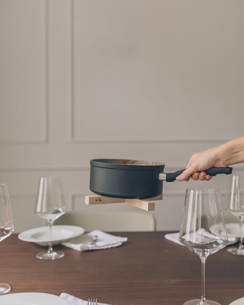 Trivet in use at a laid table